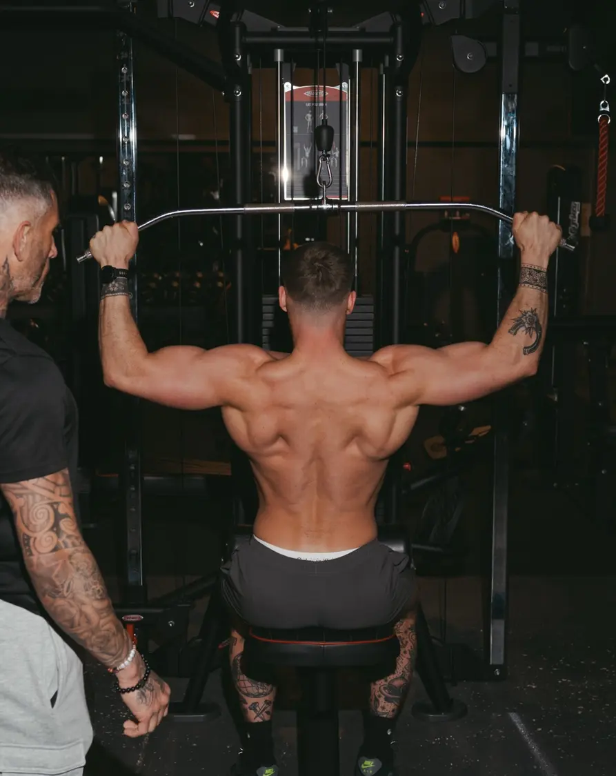 Dan Mason coaching a client through a training session
